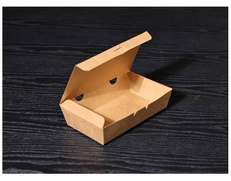 측면 구멍이 보이도록 뚜껑이 열려 있는 김밥용 크라프트 종이 도시락 용기