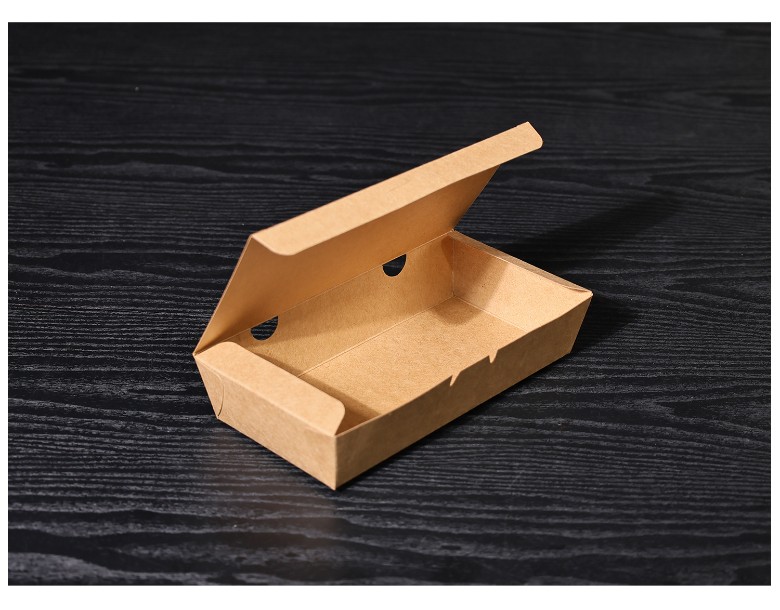 측면 구멍이 보이도록 뚜껑이 열려 있는 김밥용 크라프트 종이 도시락 용기