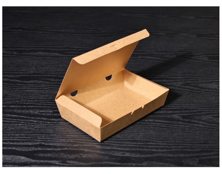 측면 구멍이 보이도록 뚜껑이 열려 있는 김밥용 크라프트 종이 도시락 용기